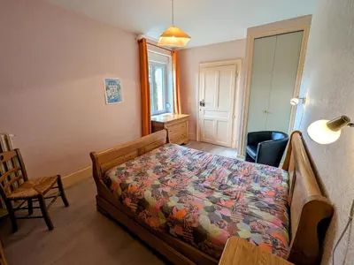 Un ou plusieurs lits dans un hébergement de l'établissement Appartement rénové au pied des Mille Étangs, 3 chambres - FR-1-583-410