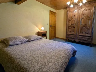 Un ou plusieurs lits dans un hébergement de l'établissement Gîte chaleureux dans les Vosges avec cheminée - FR-1-583-437