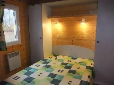 Un ou plusieurs lits dans un hébergement de l'établissement Chalet Édelweiss 35 en lisière de forêt, calme et nature - FR-1-583-444