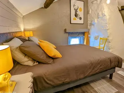 Un ou plusieurs lits dans un hébergement de l'établissement Gîte paisible dans une ancienne ferme avec WIFI et parking à Saint-Bresson - FR-1-583-440