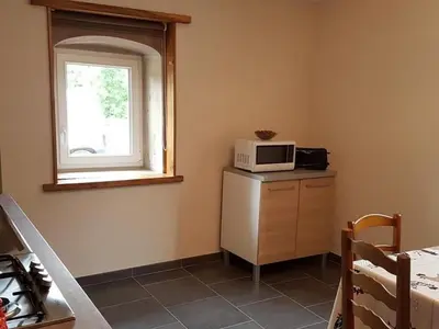 Cuisine ou kitchenette dans l'établissement Gîte nature rénové dans les Vosges Saônoises - FR-1-583-459