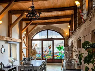 Coin salon dans l'établissement Gîte avec espace bien-être, sauna et hammam à Moffans-et-Vacheresse - FR-1-583-447