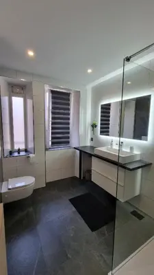 Salle de bains dans l'établissement La perle du Lion