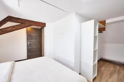 Un ou plusieurs lits dans un hébergement de l'établissement TH 202 Charmant duplex F4 au 2ème étage - 7 personnes