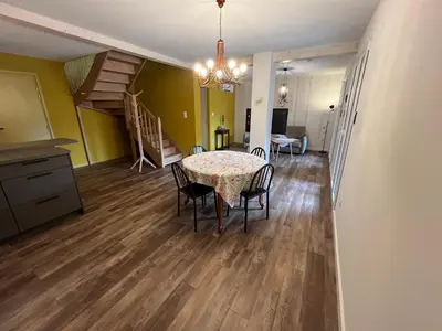 Coin salon dans l'établissement La Cour de Mamama Appartement 5