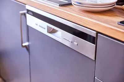 Cuisine ou kitchenette dans l'établissement TH 103 Appartement F2 à Thann 1 à 3 personnes
