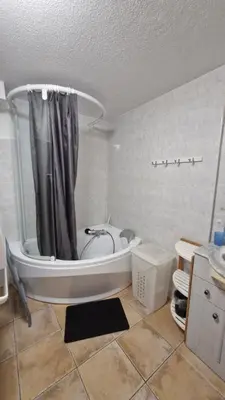 Salle de bains dans l'établissement Appartement Melou rez de chaussée