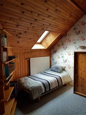 Un ou plusieurs lits dans un hébergement de l'établissement Grand appartement centre ville
