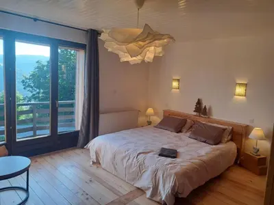 Un ou plusieurs lits dans un hébergement de l'établissement Chalet Le Belvédère, vue exceptionnelle dans les Hautes Vosges