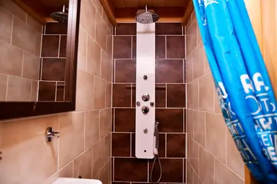 Salle de bains dans l'établissement Le Refuge