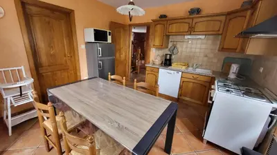 Cuisine ou kitchenette dans l'établissement Gîte des Pinsons