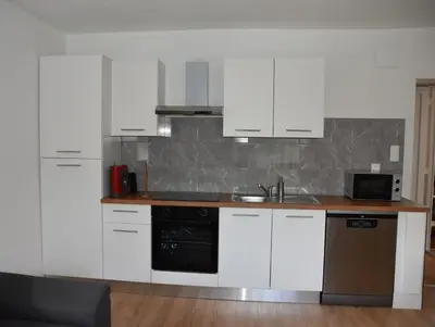 Cuisine ou kitchenette dans l'établissement Renovated cottages