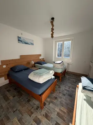 Un ou plusieurs lits dans un hébergement de l'établissement Le Gîte d'Orion