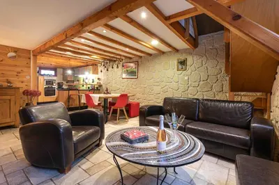 Coin salon dans l'établissement Gîte 3 étoiles avec sauna individuel chez Chanchan de 1 a 6 personnes