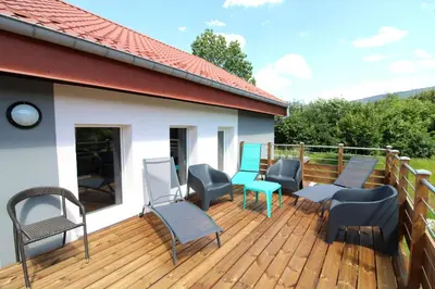 Balcon ou terrasse dans l'établissement Gîte Le Hangar 67 à Saulxures-sur-Moselotte - Location atypique proche lac