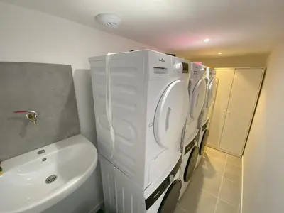 Salle de bains dans l'établissement Logement Neuf Cosy avec Espaces Communs Premium 01