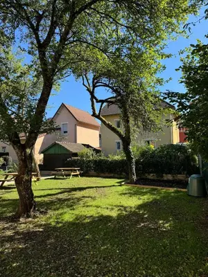 Jardin de l'établissement Logement Neuf Cosy avec Espaces Communs Premium 01