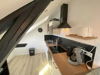Cuisine ou kitchenette dans l'établissement 4 logements Neuf Cosy avec Espaces Communs Premium