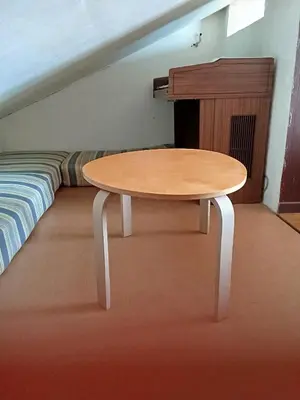 Un ou plusieurs lits dans un hébergement de l'établissement Chambre dans une appartement