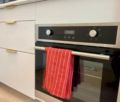 Cuisine ou kitchenette dans l'établissement A 50 mètres de la frontière de Bâle,bus-tram, avec parking