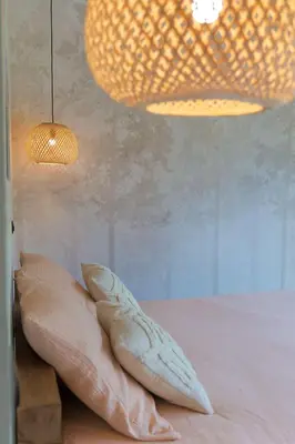 Un ou plusieurs lits dans un hébergement de l'établissement L'écolodgia suite & spa