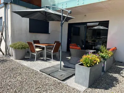 Terrasse ou espace extérieur de l'établissement Très beau gîte tout confort