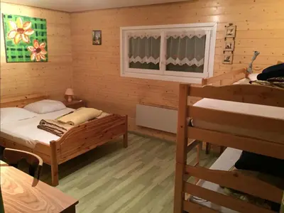 Un ou plusieurs lits dans un hébergement de l'établissement Grand chalet familial - Vue montagne, La Bresse