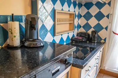 Cuisine ou kitchenette dans l'établissement La Terrasse des Vosges Calme et vue sublime