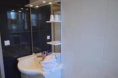 Salle de bains dans l'établissement Appartement Timgad