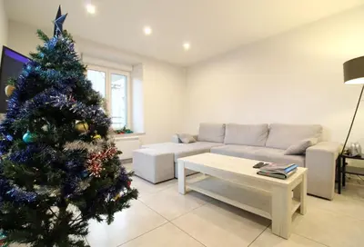 Coin salon dans l'établissement Appartement à La Bresse, proche des lacs, pistes de ski et randonnées