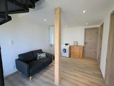 Coin salon dans l'établissement Maison 4 pers à Gérardmer entre lac et montagne avec terrasse - FR-1-589-836