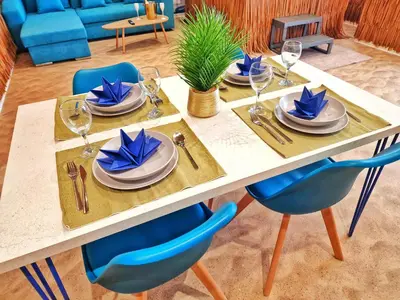 Coin salon dans l'établissement PLAYA SPA-4 Pers-Jacuzzi-Parking-Jardin-Clim-Colmar