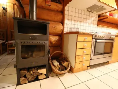 Cuisine ou kitchenette dans l'établissement Chalet Rondins des bois Lac Xonrupt