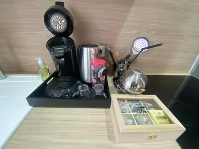 Cuisine ou kitchenette dans l'établissement Cocon Anaïs