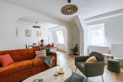 Coin salon dans l'établissement Saint-Louis Centre, Logement idéal voyageurs