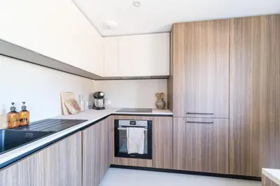 Cuisine ou kitchenette dans l'établissement Duplex Jardin – Gîte des 4 Lions