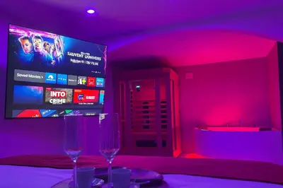 Télévision ou salle de divertissement dans l'établissement Le Refuge - Studio haut de gamme