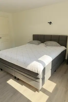 Un ou plusieurs lits dans un hébergement de l'établissement Gîte familial pied des montagnes