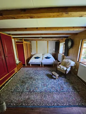 Un ou plusieurs lits dans un hébergement de l'établissement Bienvenue chez jacquou Chambre d'hôte chez l'habitant