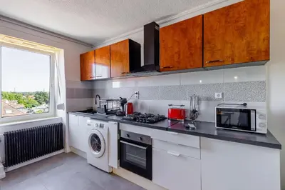 Cuisine ou kitchenette dans l'établissement Appartement Tonga - Dans Mulhouse pour 6p