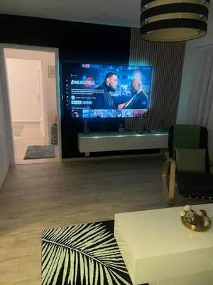 Télévision ou salle de divertissement dans l'établissement Appartement T3