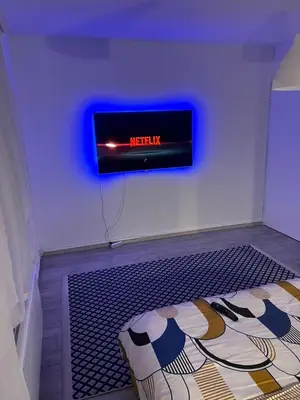 Télévision ou salle de divertissement dans l'établissement Appartement T3