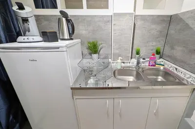 Cuisine ou kitchenette dans l'établissement Apt 32m2, Calme, Fast WiFi