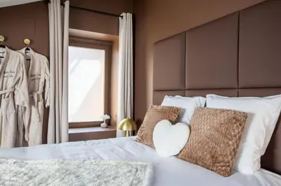 Un ou plusieurs lits dans un hébergement de l'établissement Suite Choco Love and SPA