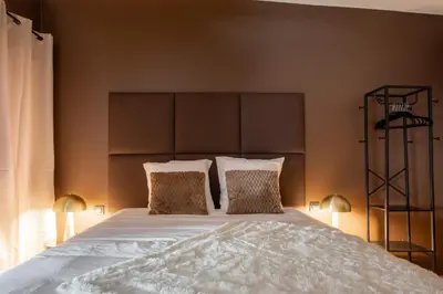 Un ou plusieurs lits dans un hébergement de l'établissement Suite Choco Love and SPA