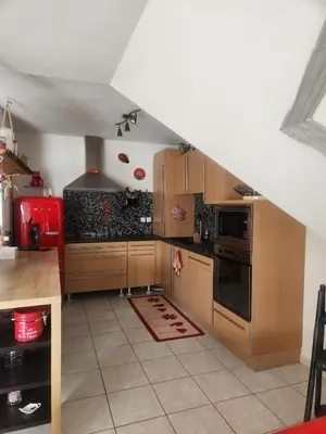Cuisine ou kitchenette dans l'établissement Appartement cosy à 5mn du Parc des Expositions