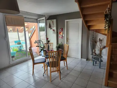 Coin salon dans l'établissement Appartement cosy à 5mn du Parc des Expositions