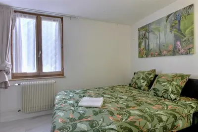 Un ou plusieurs lits dans un hébergement de l'établissement Le Repaire du Lion - Quadruplex - 10 voyageurs