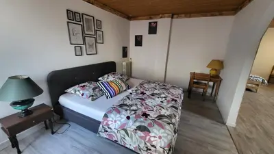 Un ou plusieurs lits dans un hébergement de l'établissement Suite Cosy Deluxe 