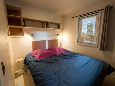 Un ou plusieurs lits dans un hébergement de l'établissement Mobil-home de 26m² avec terrasse pour 4 personnes - API-1-52-556